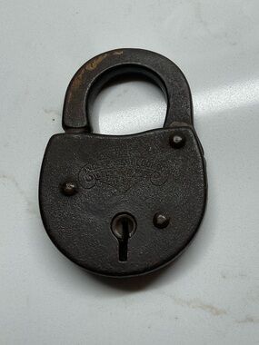 Antique Padlock with 2 keys - Brand Independent is very worn down.